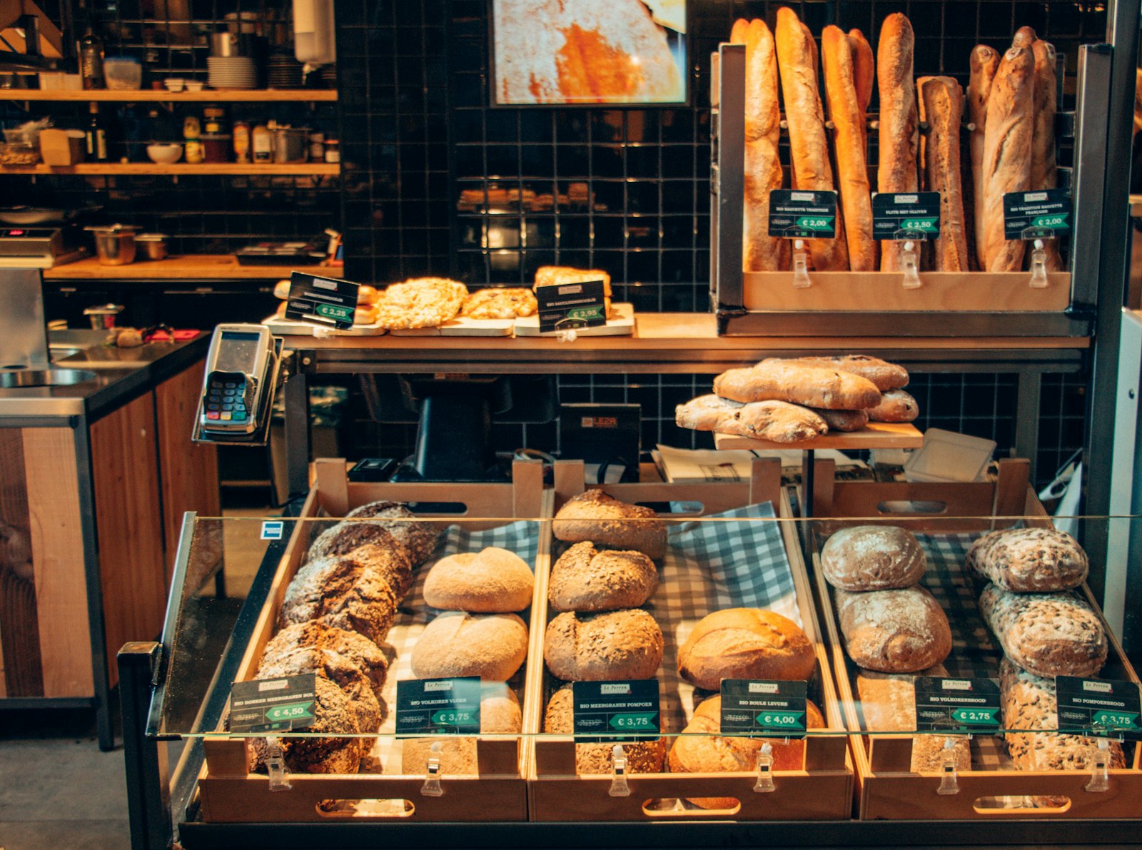 Bakery shelves full of baked goods